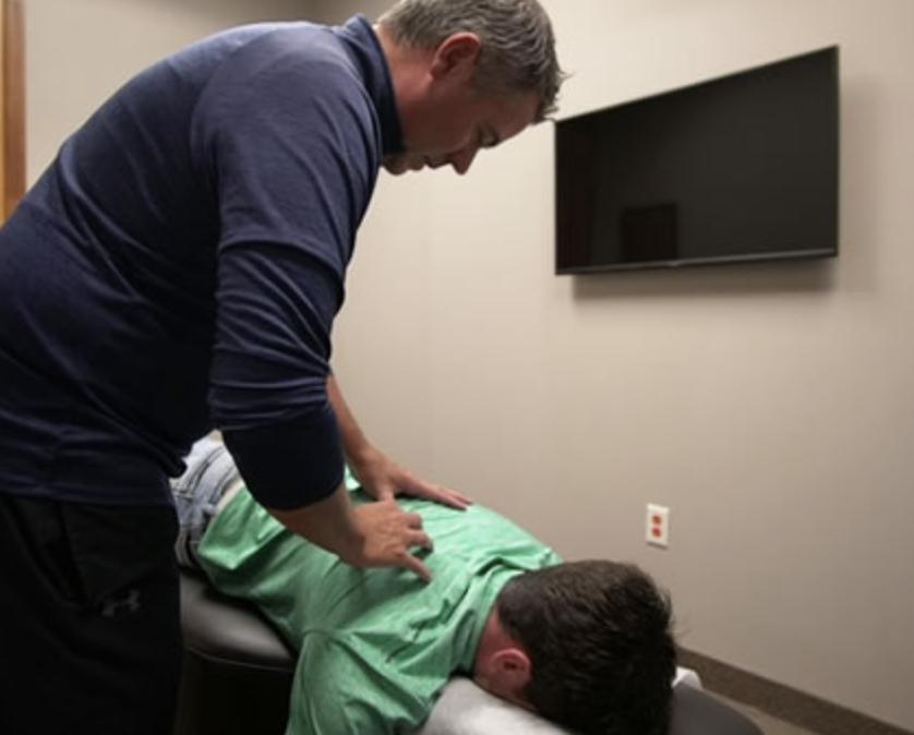 Healthcare professional consulting with patient